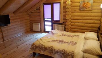 Фото номера Дом с 3 спальнями Лоджи Filvarok Cottage г. Березовка 4