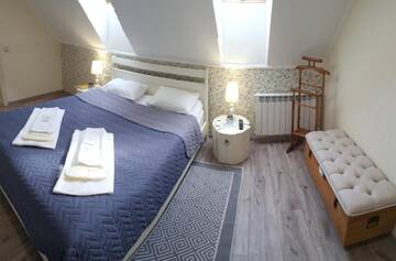 Фото номера Двухместный номер Делюкс с 1 кроватью Отель Filvarok Hotel г. Березовка 2